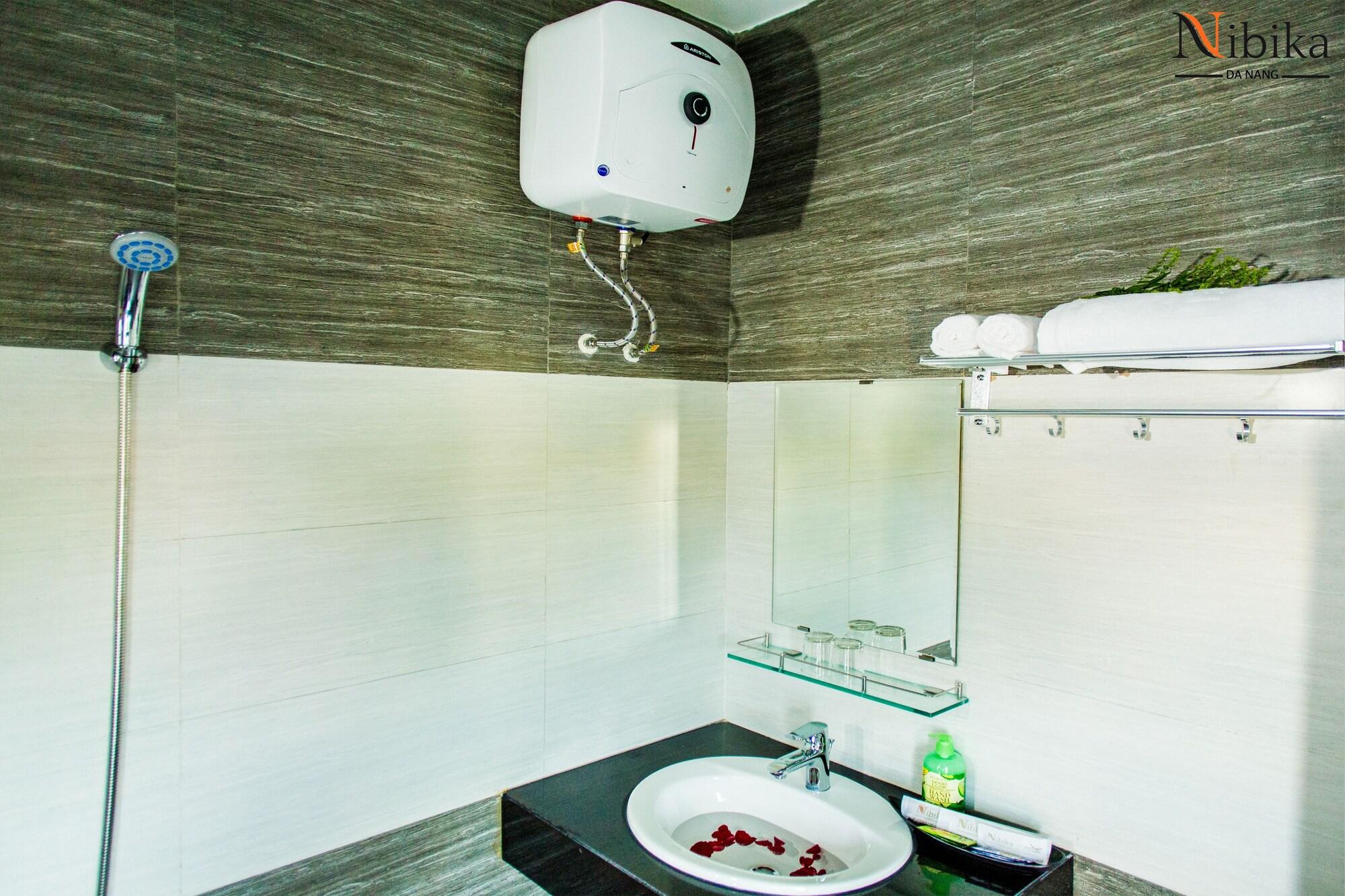 Bamboo Hotel Da Nang Bagian luar foto