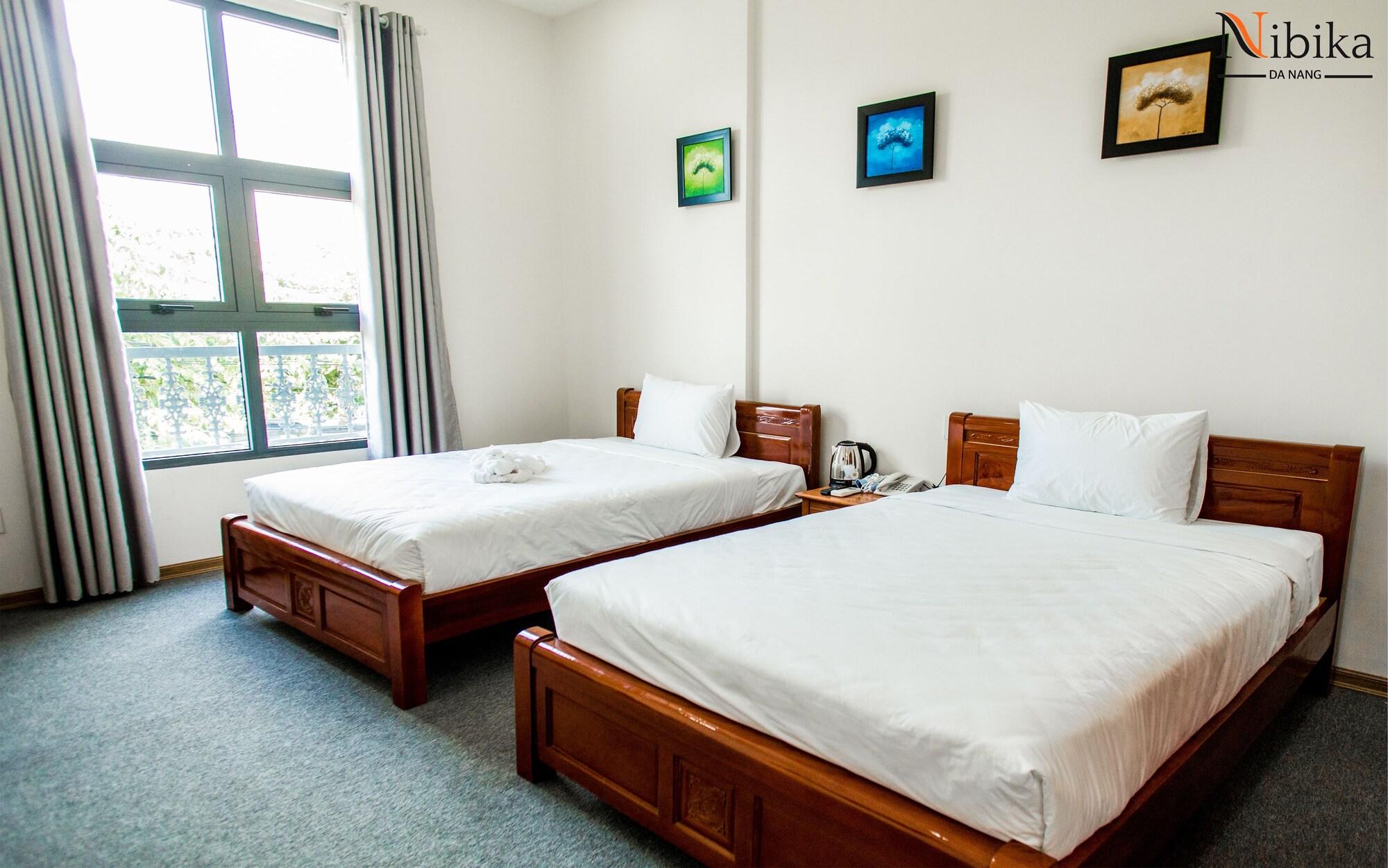 Bamboo Hotel Da Nang Bagian luar foto