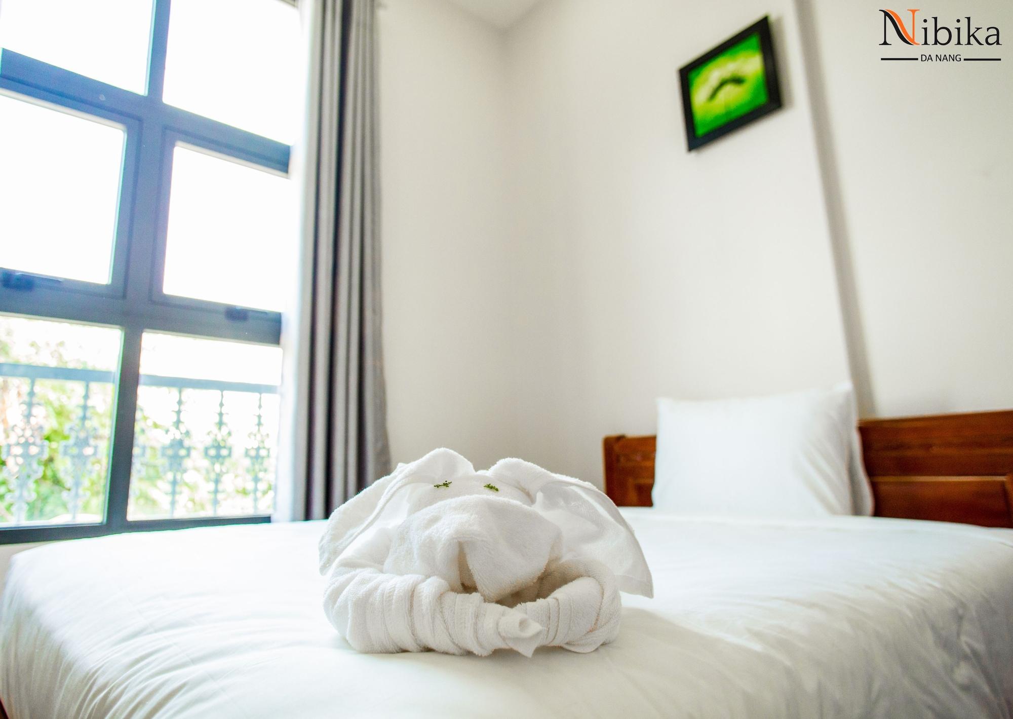 Bamboo Hotel Da Nang Bagian luar foto