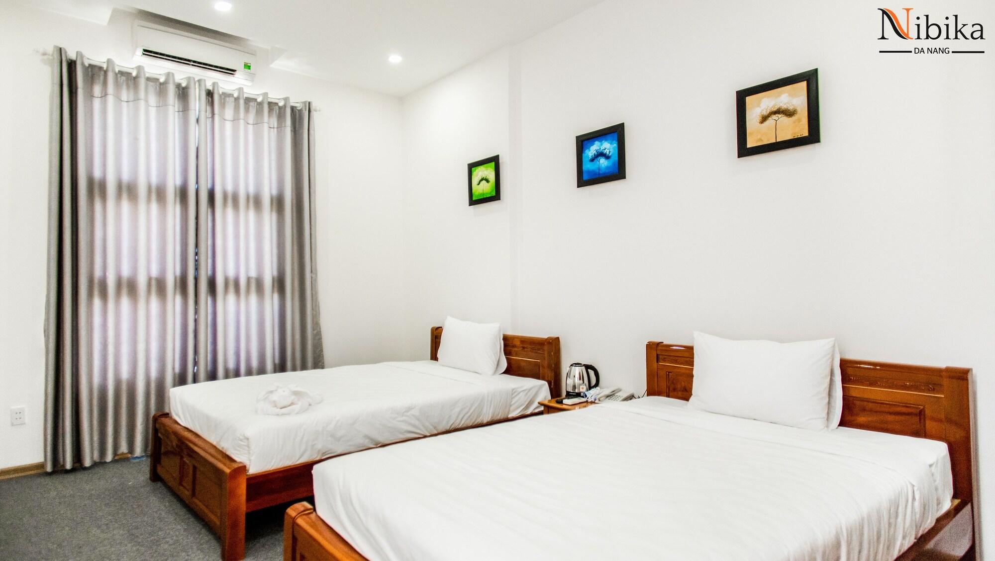 Bamboo Hotel Da Nang Bagian luar foto