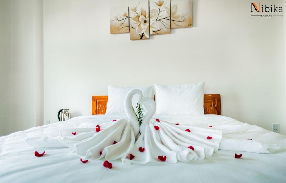 Bamboo Hotel Da Nang Bagian luar foto